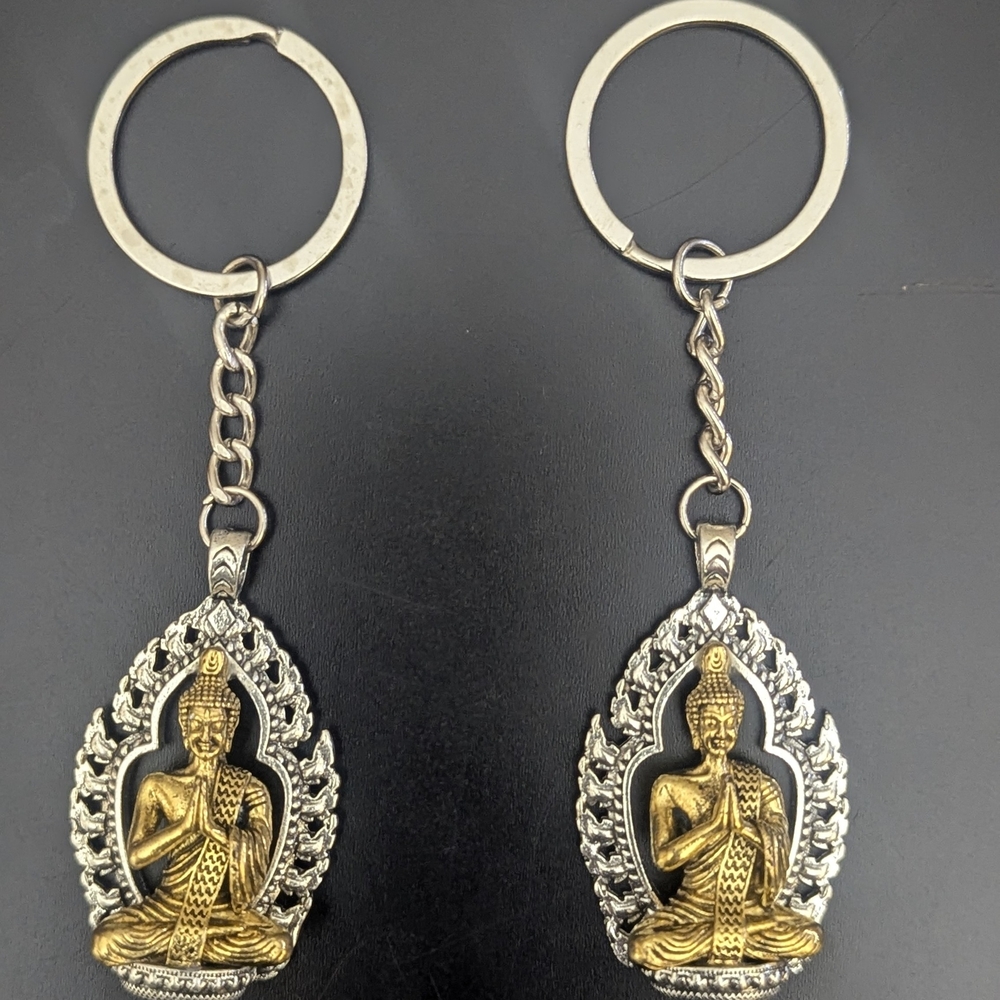 A Pair Of Buddha Keychain Set in Gold and Silver Colored For Couples